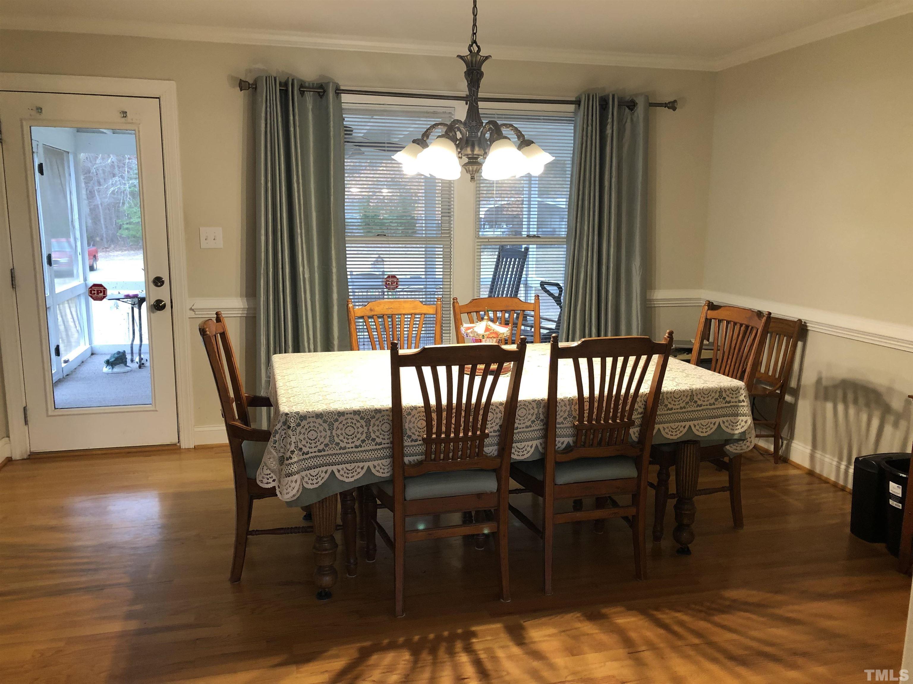 770 Cross Link Drive Angier, NC 27501 - Photo 4 of 23 a view of a dining room with furniture window and wooden floor