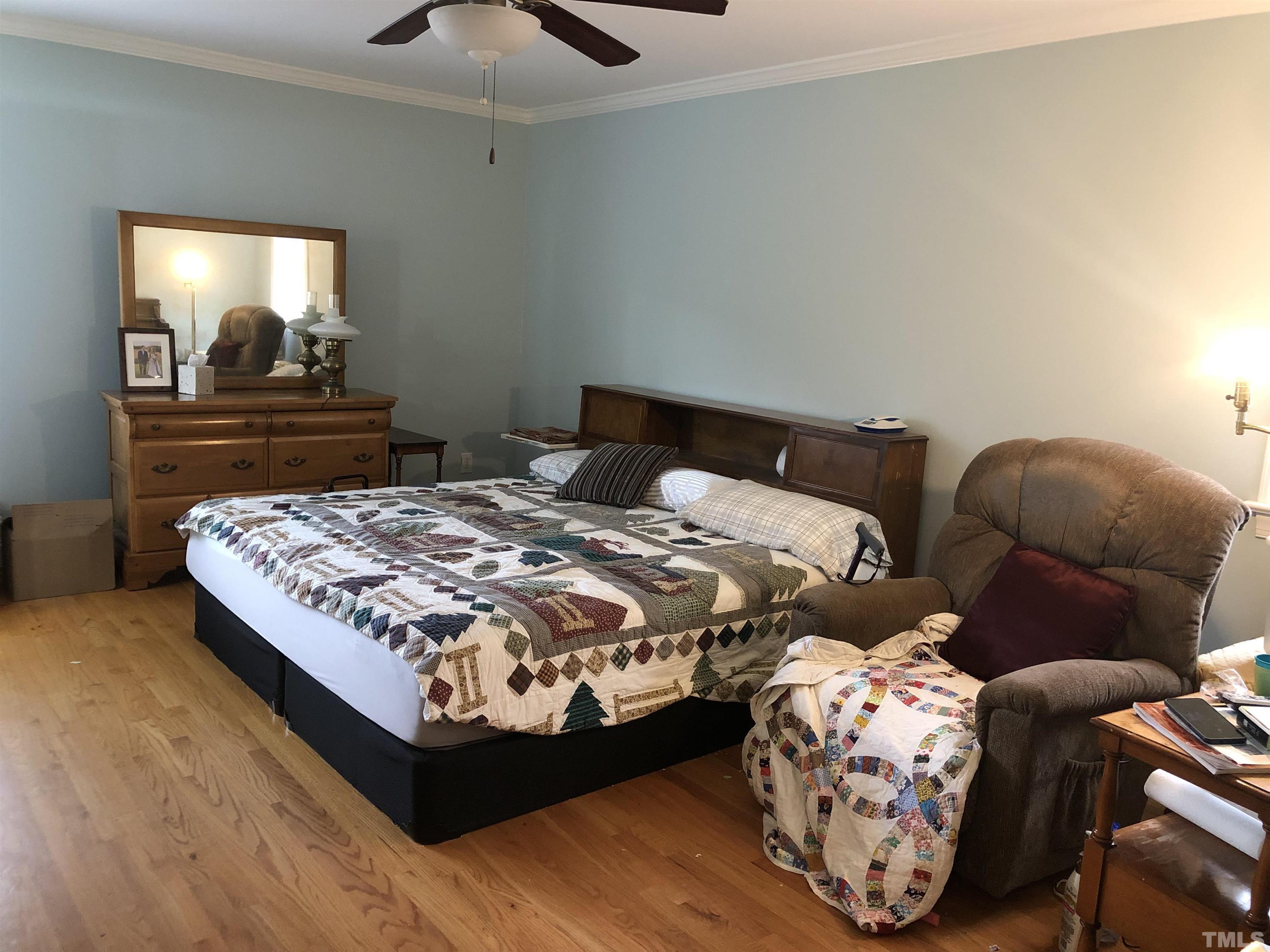 770 Cross Link Drive Angier, NC 27501 - Photo 10 of 23 a bedroom with a bed and window