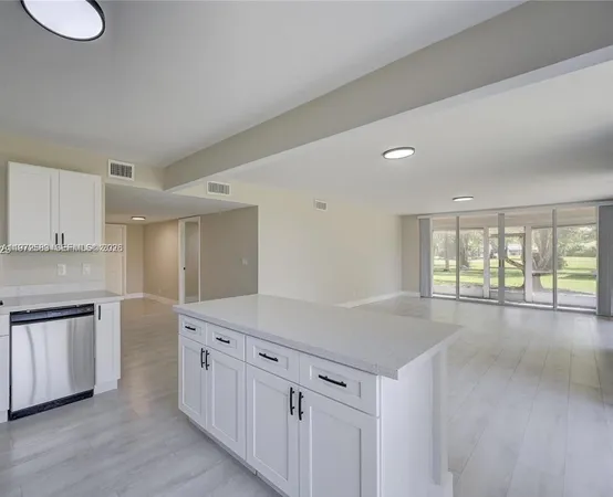 $330,000 | 7582 Northwest 86th Terrace, Unit 104, Tamarac, FL 33321