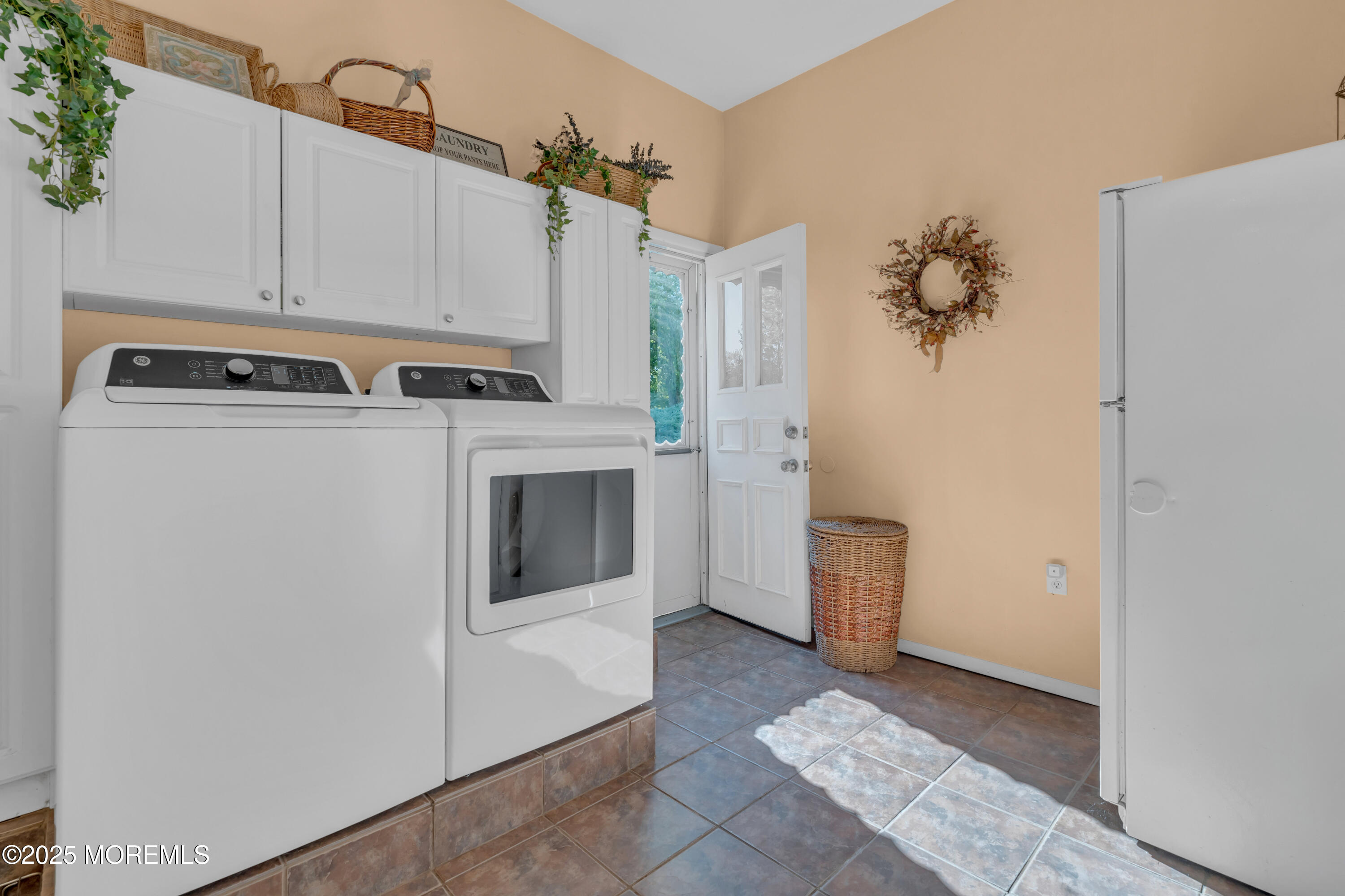 232 Bar Harbor Road Freehold, NJ 07728 - Photo 11 of 42 a view of a kitchen with refrigerator and stove