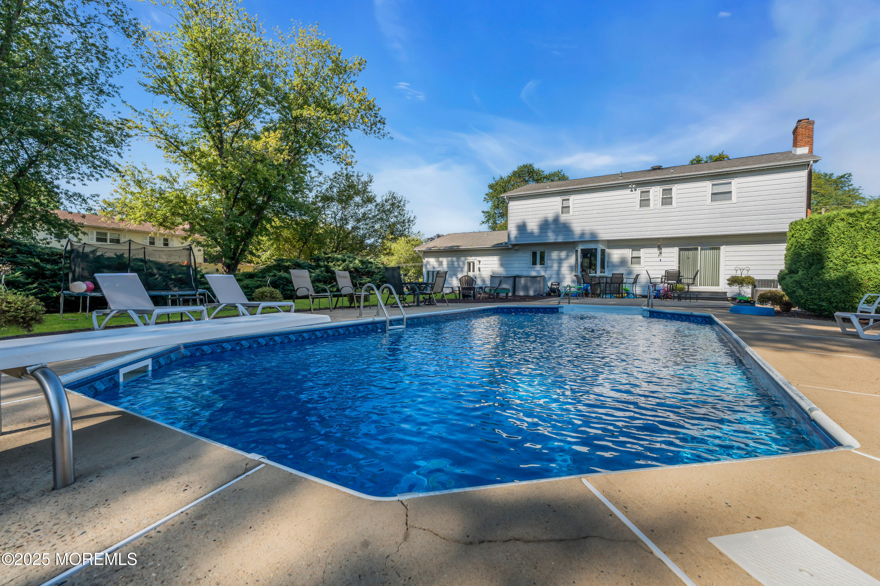 232 Bar Harbor Road Freehold, NJ 07728 - Photo 35 of 42 a view of swimming pool with outdoor seating
