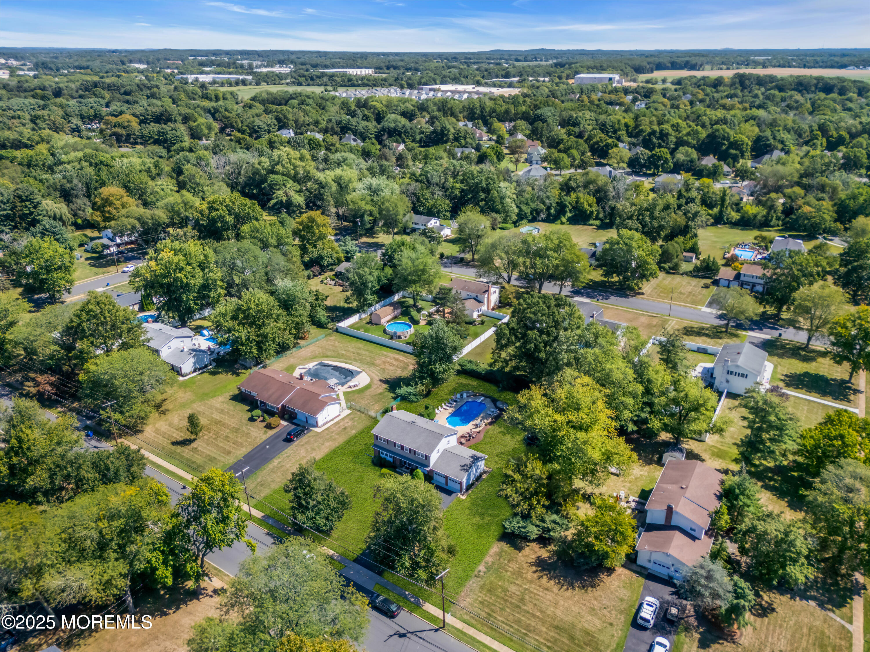 232 Bar Harbor Road Freehold, NJ 07728 - Photo 37 of 42 an aerial view of residential houses with outdoor space and trees