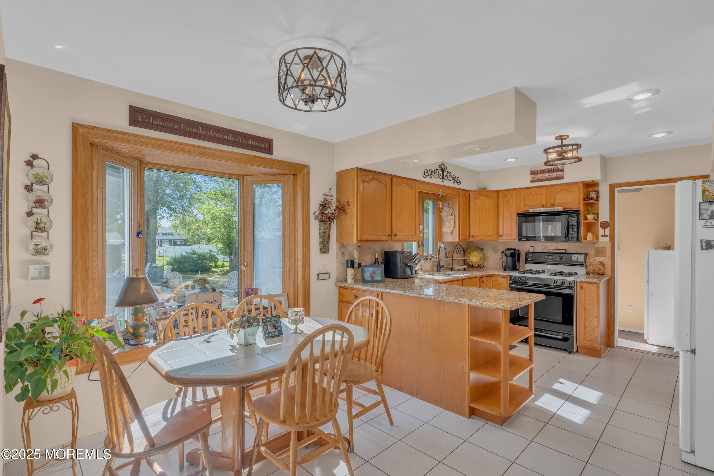 232 Bar Harbor Road Freehold, NJ 07728 - Photo 7 of 42 a view of a dining room and livingroom view