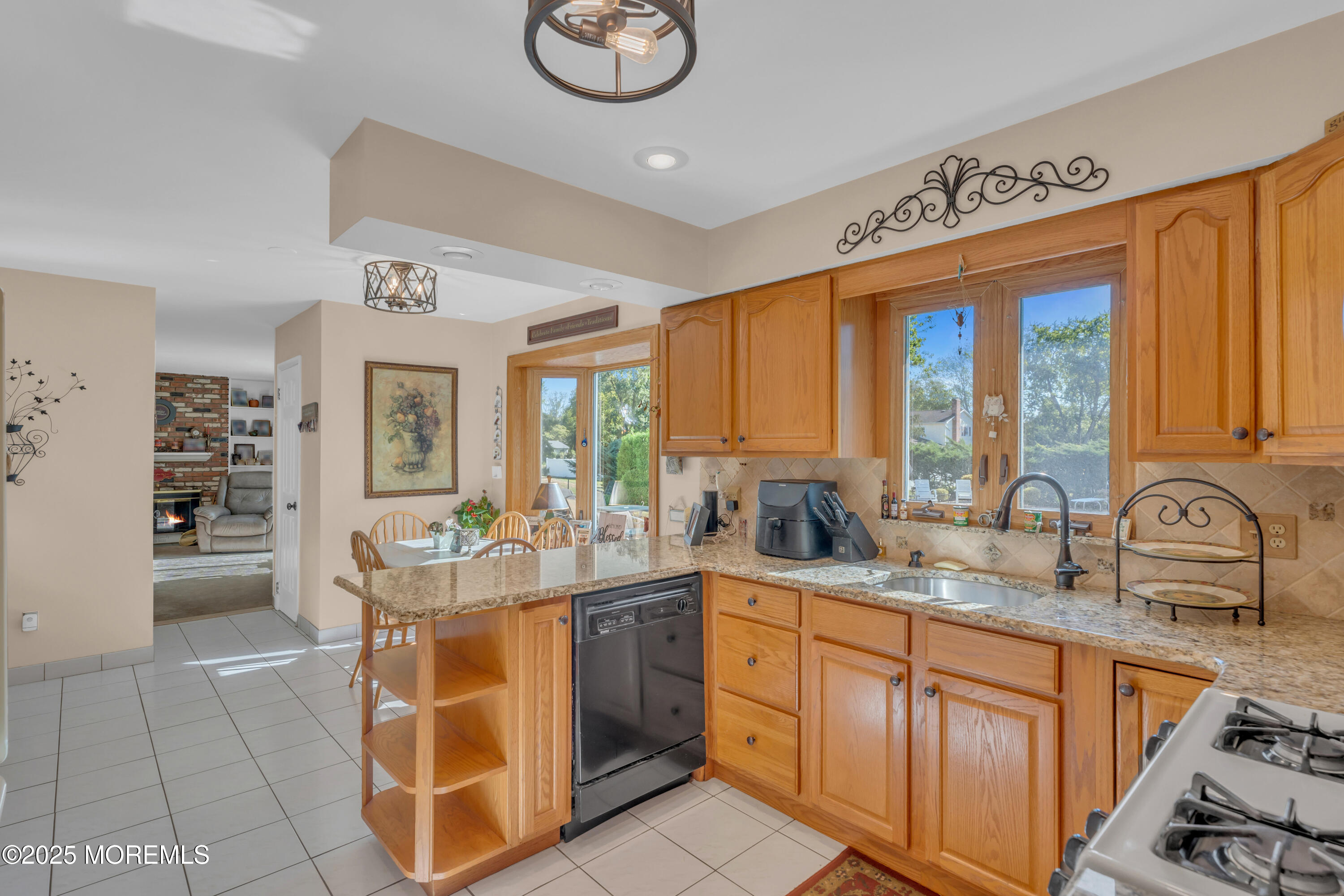 232 Bar Harbor Road Freehold, NJ 07728 - Photo 8 of 42 a kitchen with stainless steel appliances granite countertop a sink and cabinets