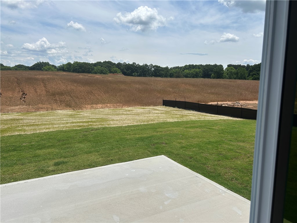 217 Bellflower Lane Anderson, SC 29625 - Photo 26 of 27 Embrace peaceful rural views from this property's well-maintained lawn and spacious outdoor area.