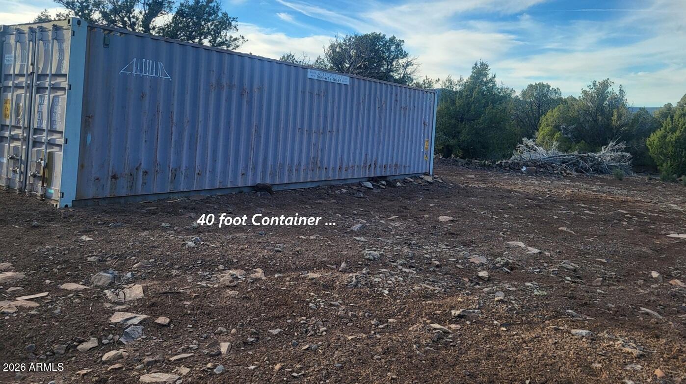 15115 Noseeum Road, Unit 261 Williams, AZ 86046 - Photo 8 of 19 a view of a backyard with wooden fence