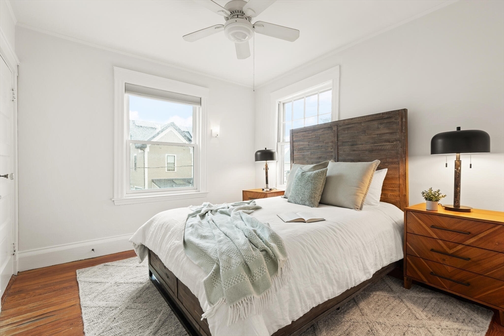 60 Crescent Street, Unit 2 Cambridge, MA 02138 - Photo 11 of 23 a bedroom with bed and window