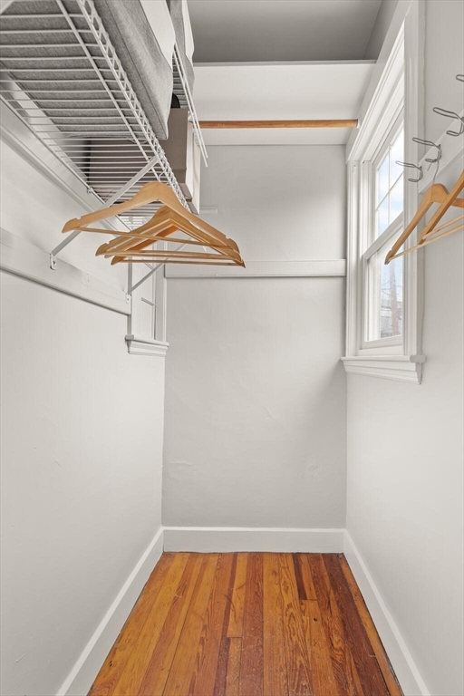 60 Crescent Street, Unit 2 Cambridge, MA 02138 - Photo 12 of 23 a view of small space with racks on the wall
