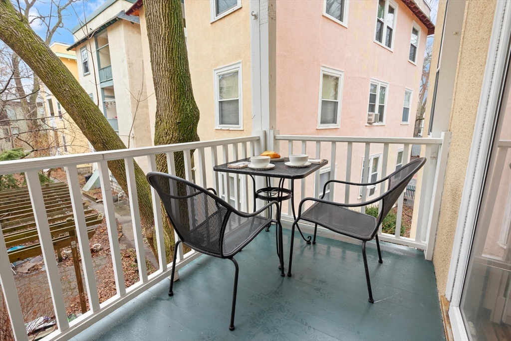 60 Crescent Street, Unit 2 Cambridge, MA 02138 - Photo 16 of 23 a view of a balcony with furniture