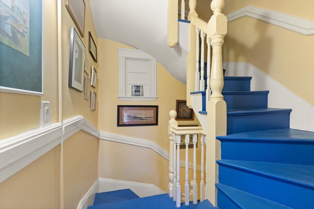 60 Crescent Street, Unit 2 Cambridge, MA 02138 - Photo 17 of 23 a view of entryway and hall with wooden floor