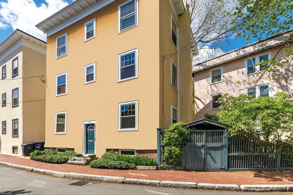 60 Crescent Street, Unit 2 Cambridge, MA 02138 - Photo 19 of 23 a front view of a house with street