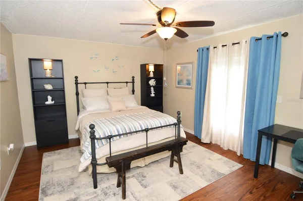 an aerial view of a house with a lake view