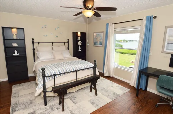 a view of a golf course with a lake