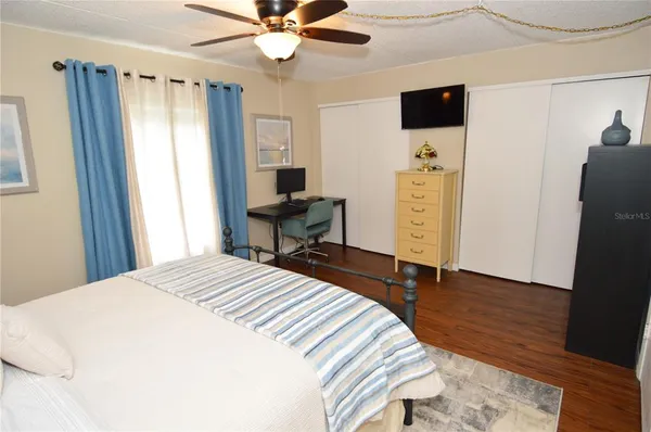 a view of a park with swings and slides