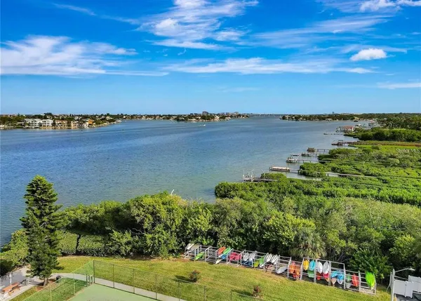 a view of bike storage next to a yard