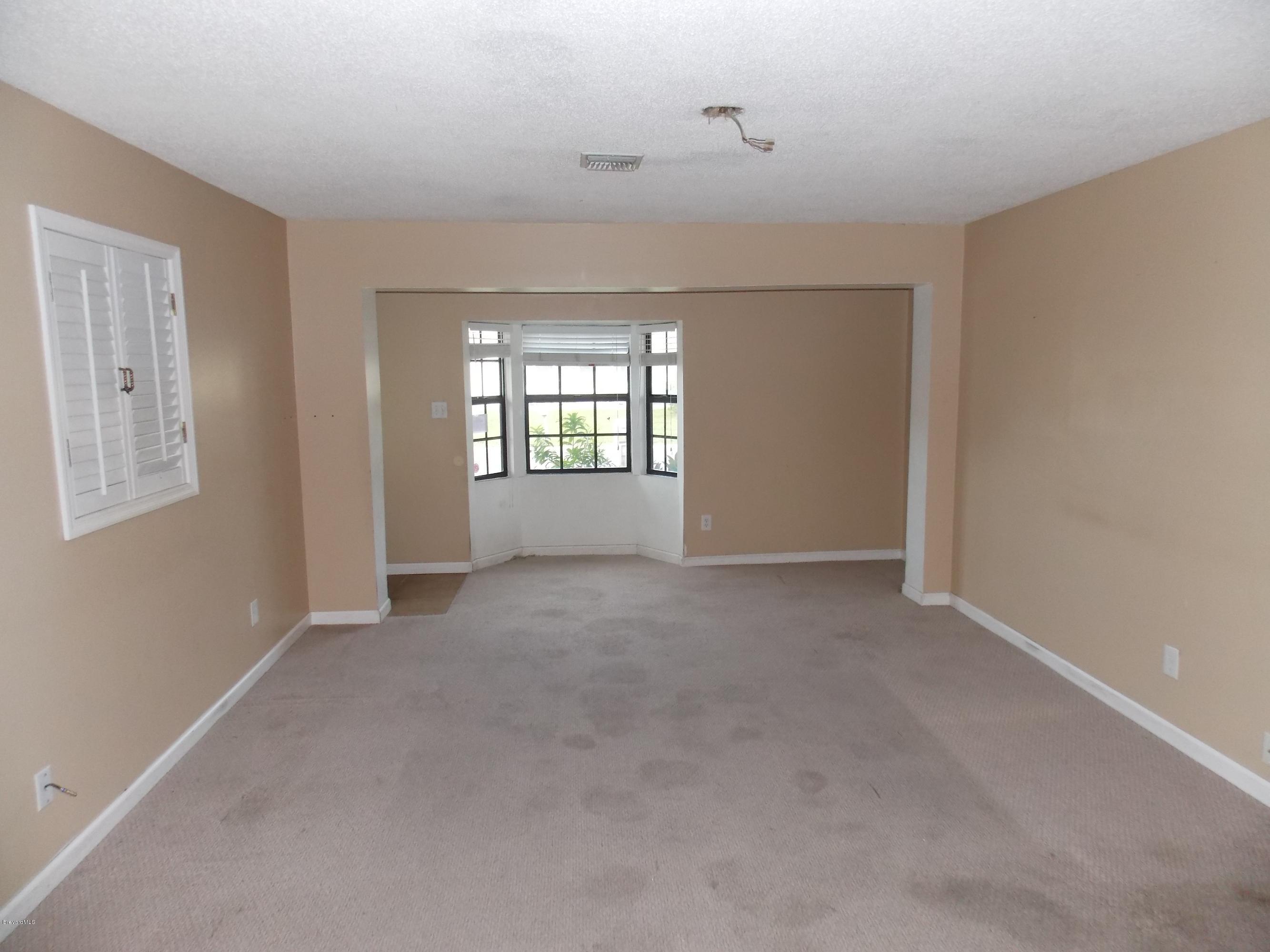 2685 King Richard Road Melbourne, FL 32935 - Photo 8 of 10 Living room
