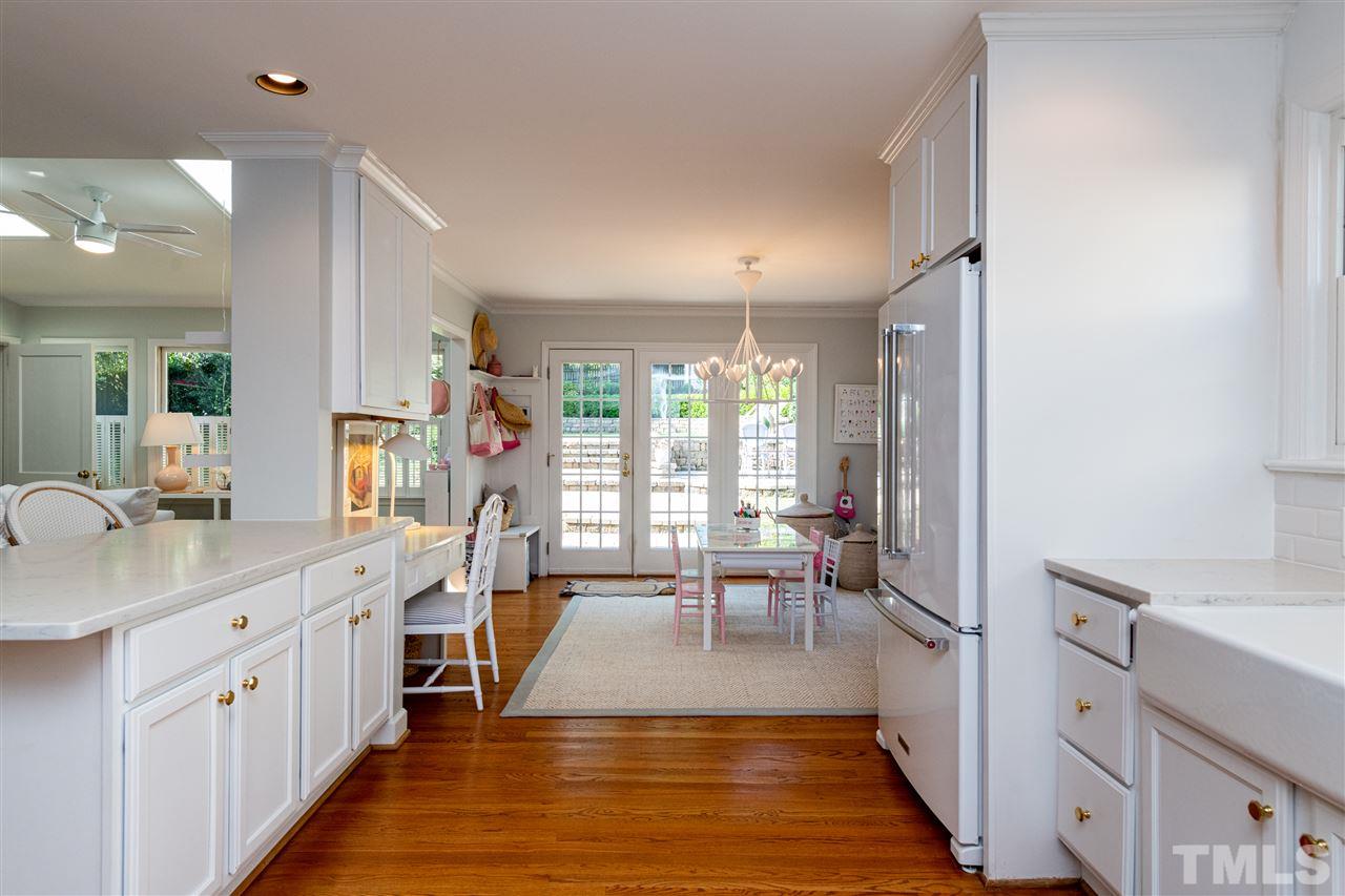 2705 Cooleemee Drive Raleigh, NC 27608 - Photo 14 of 30 The kitchen flows right into a spacious breakfast nook.