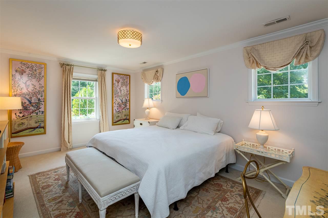 2705 Cooleemee Drive Raleigh, NC 27608 - Photo 19 of 30 The master suite is appropriately sized and the bathroom offers a practical layout with plenty of space.