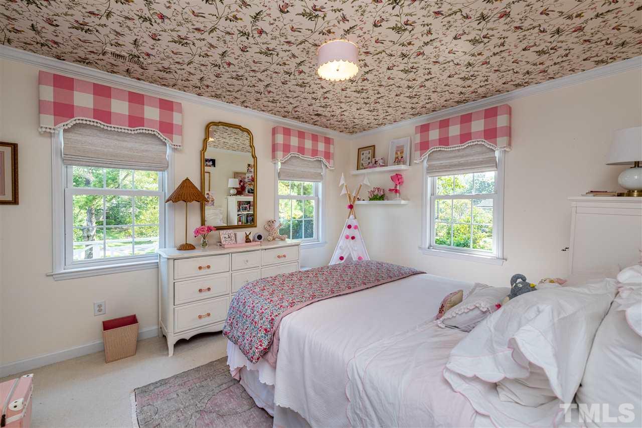 2705 Cooleemee Drive Raleigh, NC 27608 - Photo 20 of 30 This bedroom enjoys a great view!
