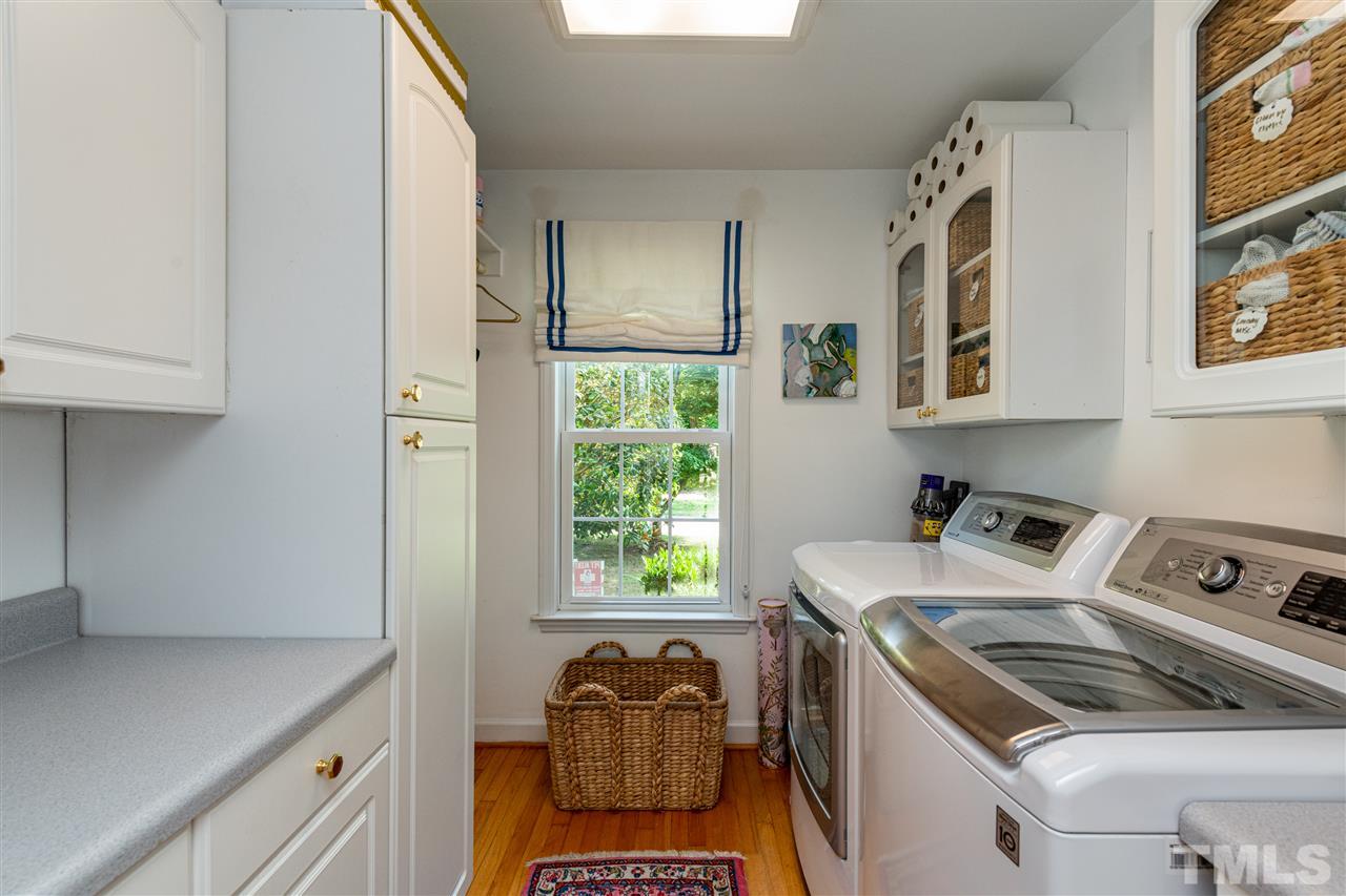 2705 Cooleemee Drive Raleigh, NC 27608 - Photo 23 of 30 Plenty of thought went into this space as well. You have natural light from a window and plenty of cabinet and counter top space.