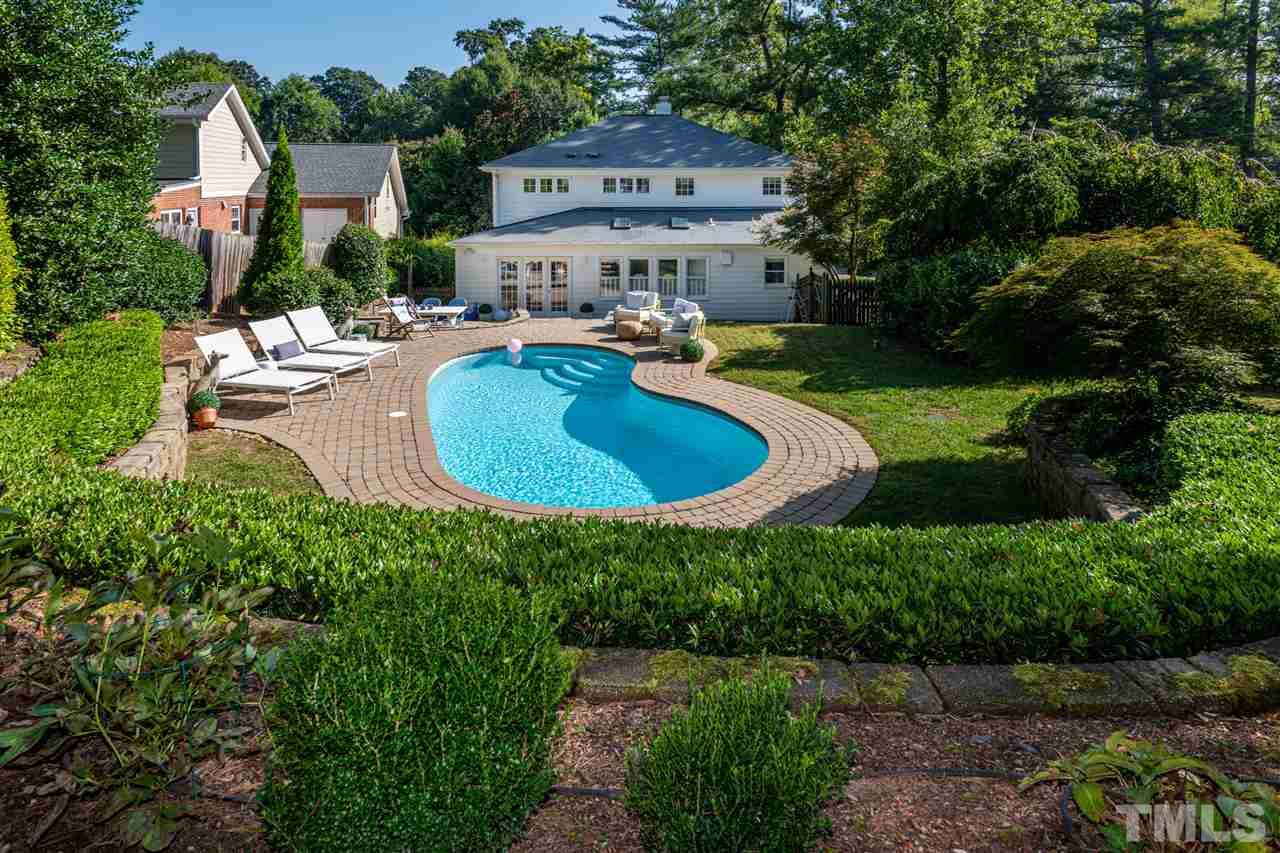 2705 Cooleemee Drive Raleigh, NC 27608 - Photo 27 of 30 The pool is amazing, but the back yard as a whole offers space for the family pet, and abundant landscaping creating plenty of privacy.