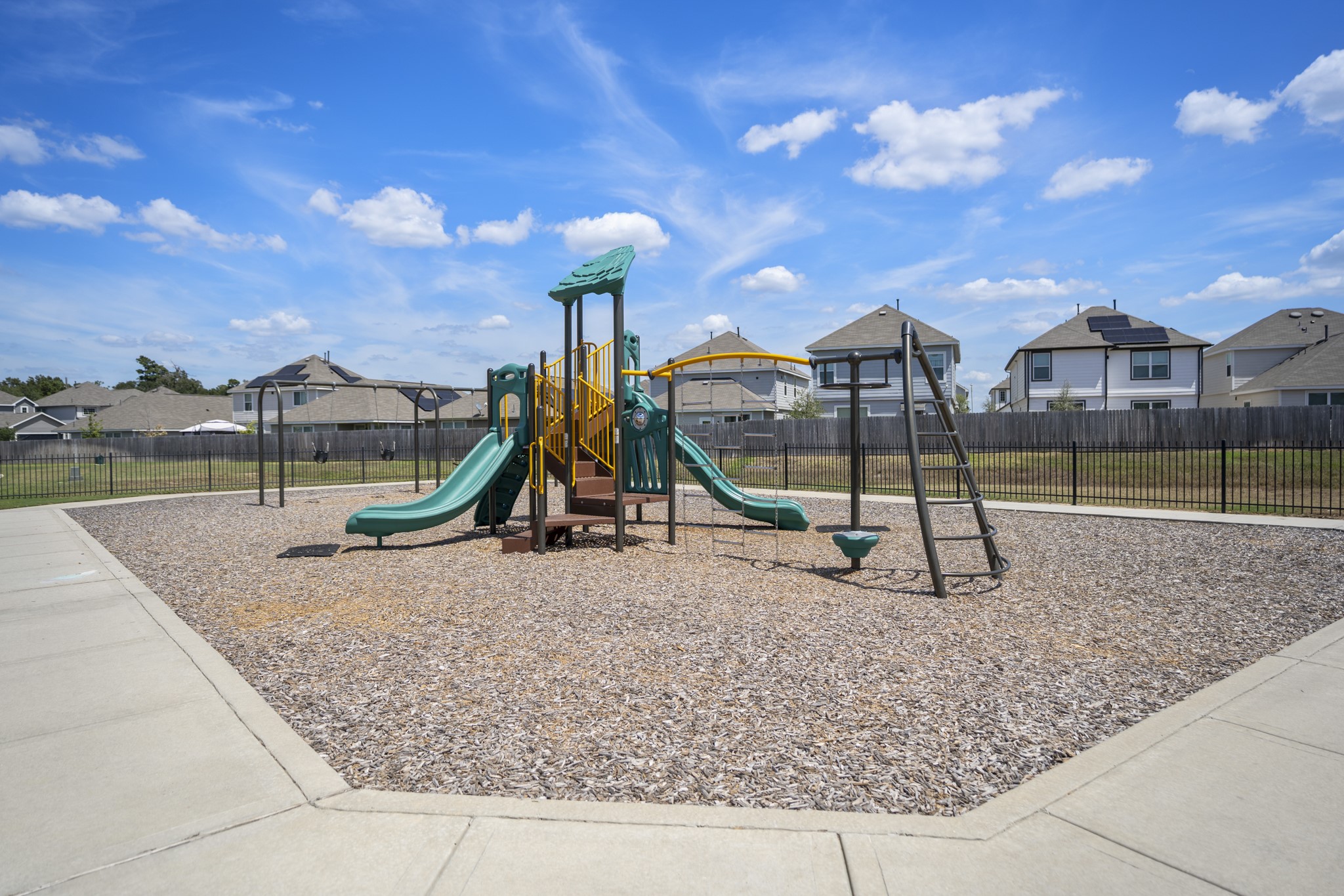 2355 Mount Locke Path Conroe, TX 77301 - Photo 46 of 47 Finishing the tour with a look around Cliffstone Hills, the community playground adds another nearby spot to enjoy just beyond home. With the pool and other neighborhood amenities close by, everyday recreation is easy to work into the routine.