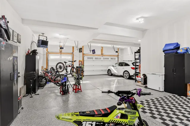 a room with gym equipment and a table