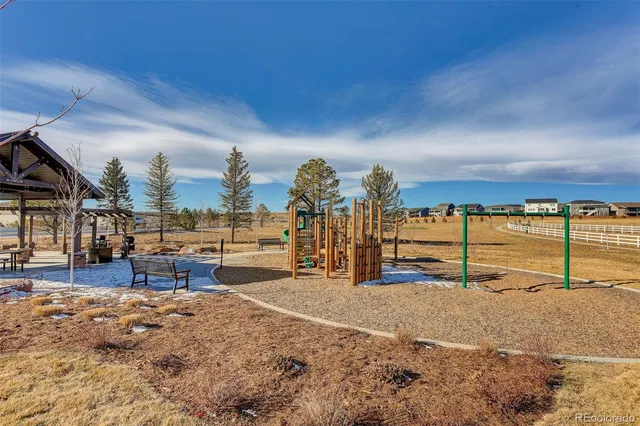 a view of a backyard of a house
