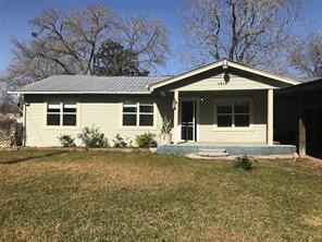 1414 Woodward Street Damon, TX 77430 - Photo 1 of 5 a front view of a house