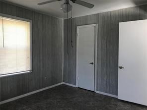 1414 Woodward Street Damon, TX 77430 - Photo 3 of 5 a view of an empty room with a window