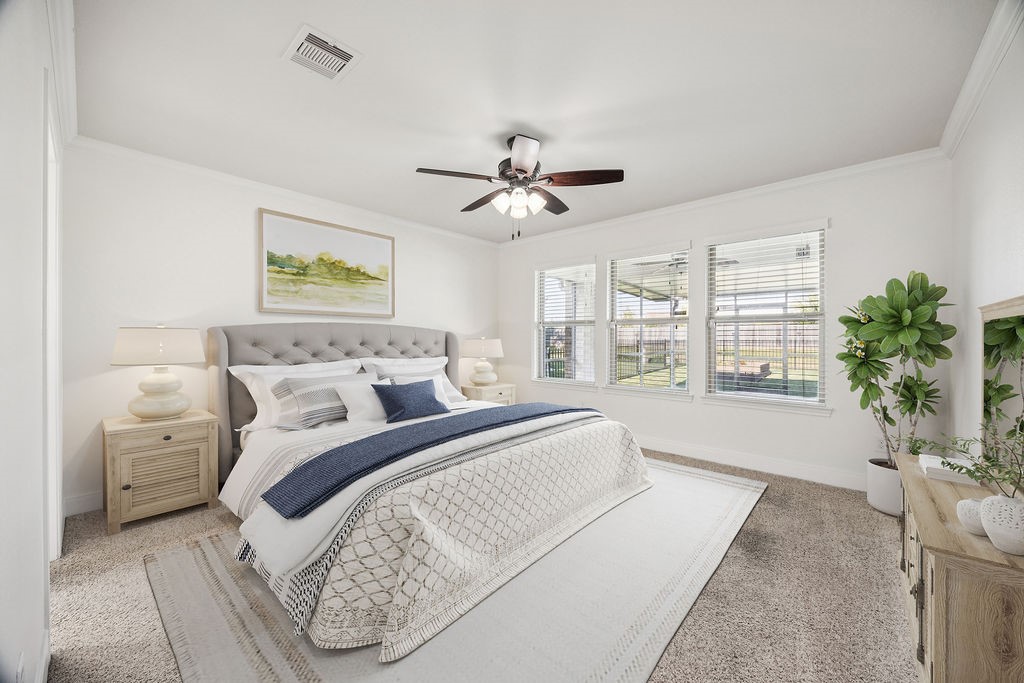 342 Ranch House Lane Richmond, TX 77469 - Photo 8 of 17 a spacious bedroom with a large bed and a chandelier