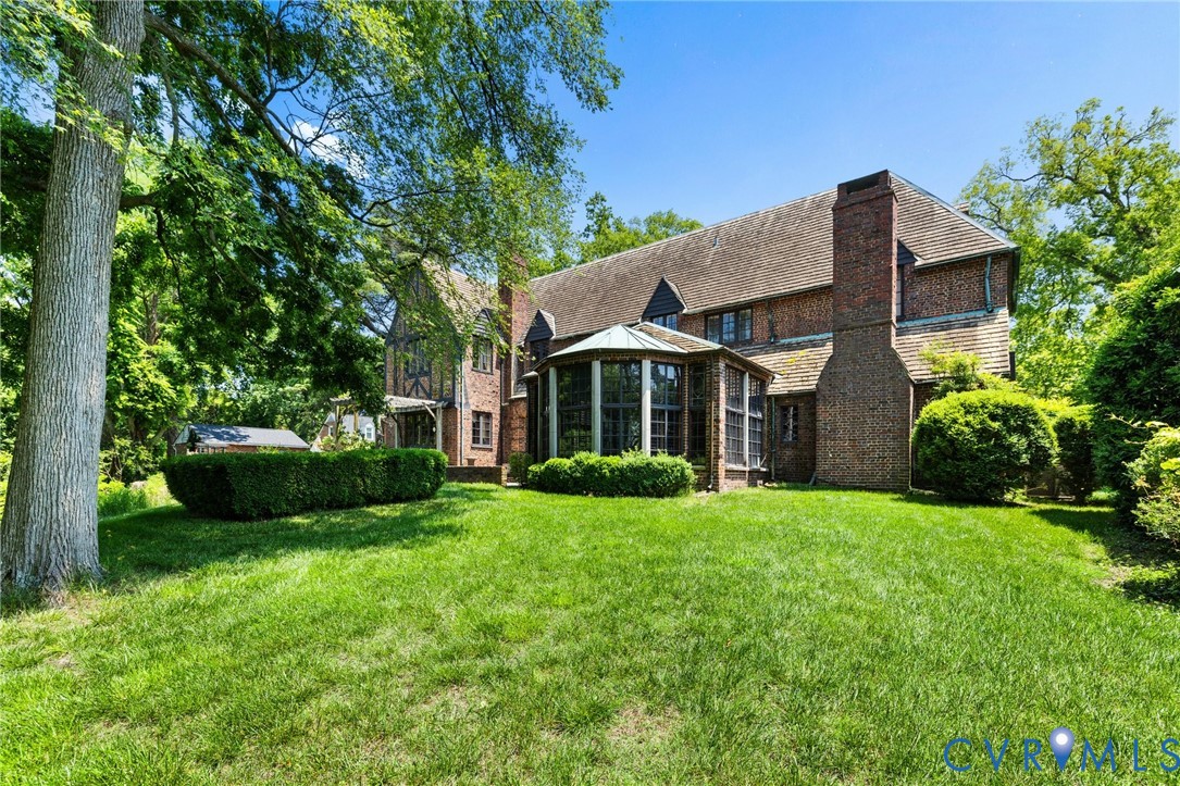 701 Appomattox Street Hopewell, VA 23860 - Photo 25 of 32 a view of a house with a yard and sitting area