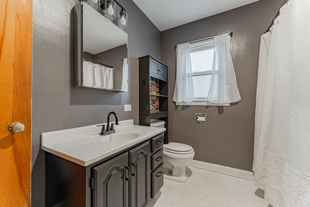 a bathroom with a sink and a toilet