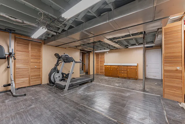 a view of a room with wooden ceiling