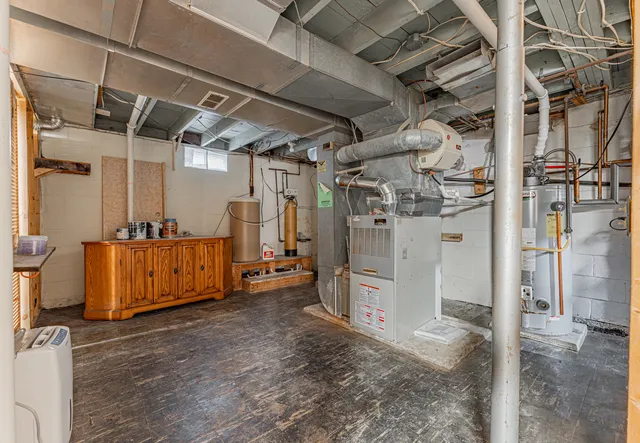 a view of a room with wooden walls