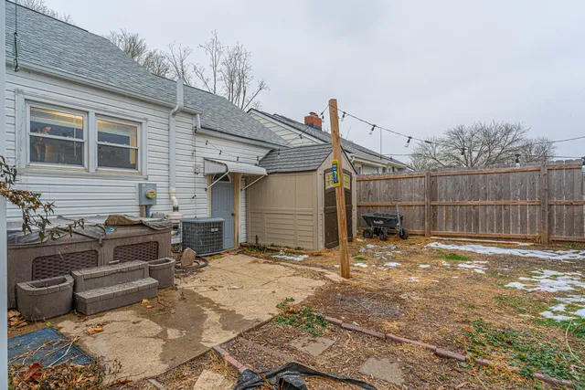 a view of backyard with a patio