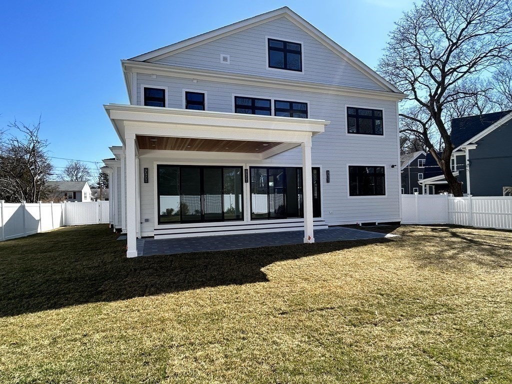 9 Richard Road Needham, MA 02492 - Photo 27 of 31 a front view of a house with yard