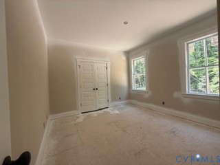 14502 Gatewood Road Dewitt, VA 23840 - Photo 16 of 32 an empty room with windows and closet