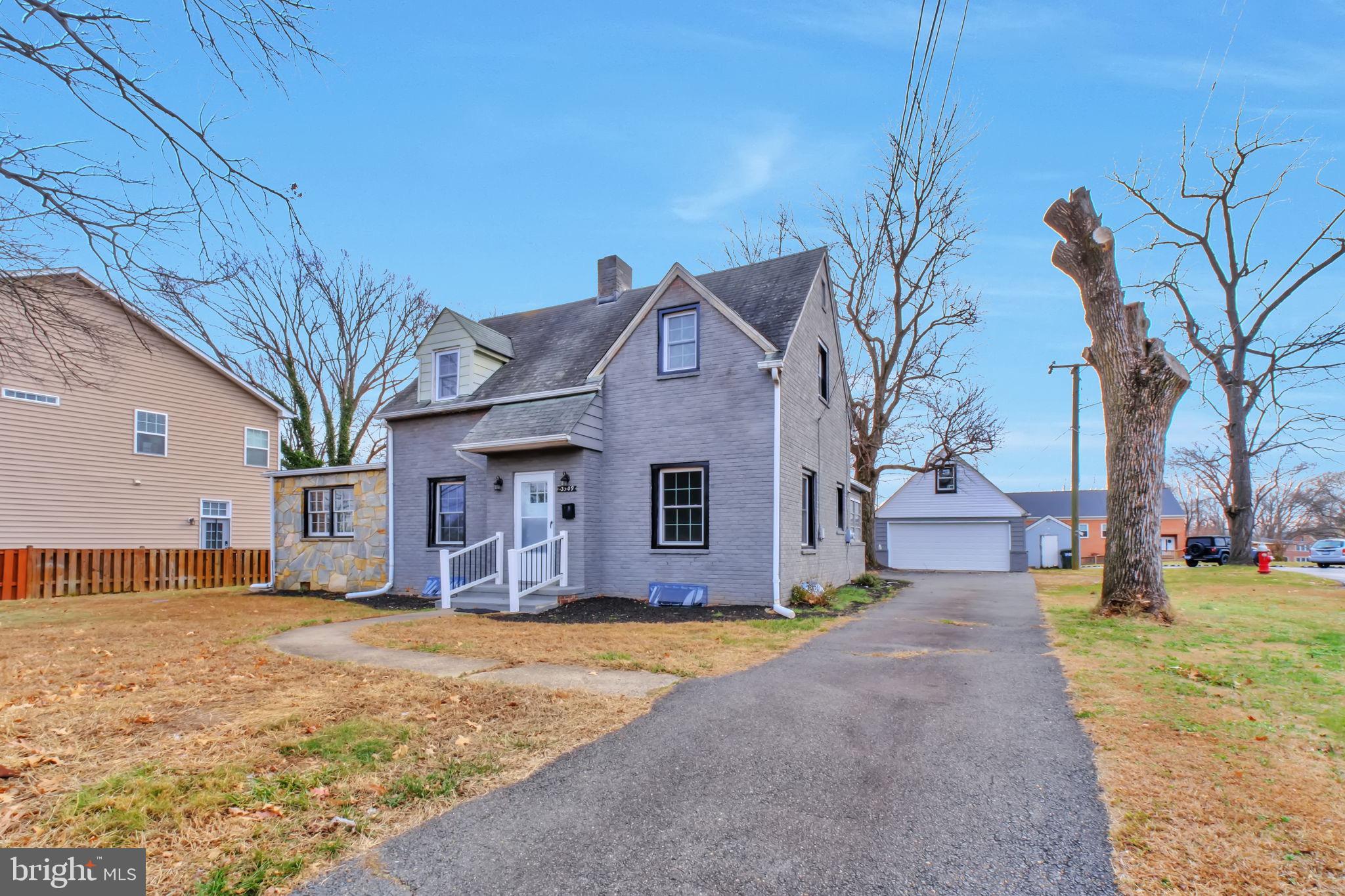 3509 Annandale Road Annandale, VA 22003 - Photo 25 of 30 a front view of a house with a yard