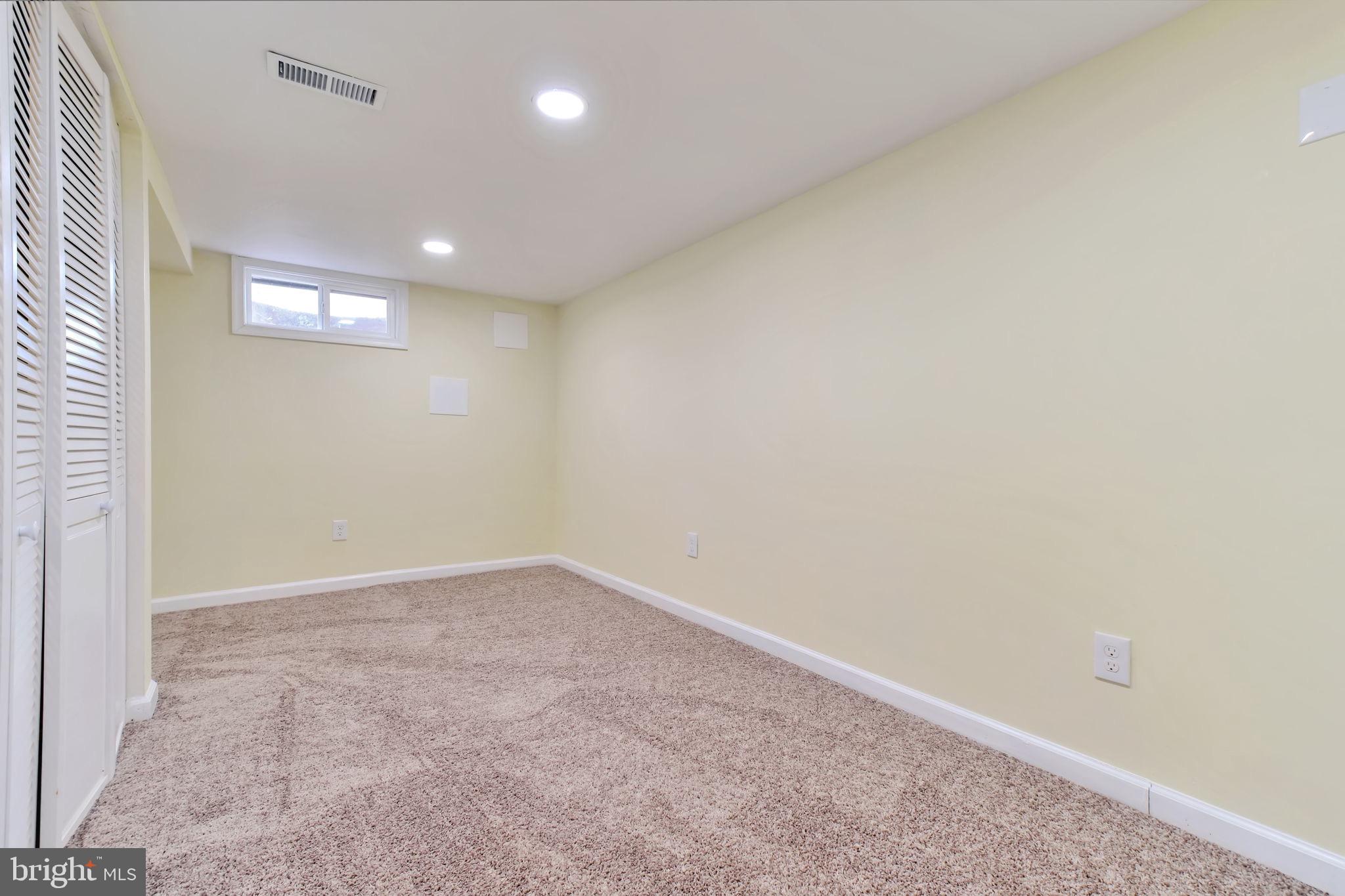 3509 Annandale Road Annandale, VA 22003 - Photo 27 of 30 an empty room with windows and entrance
