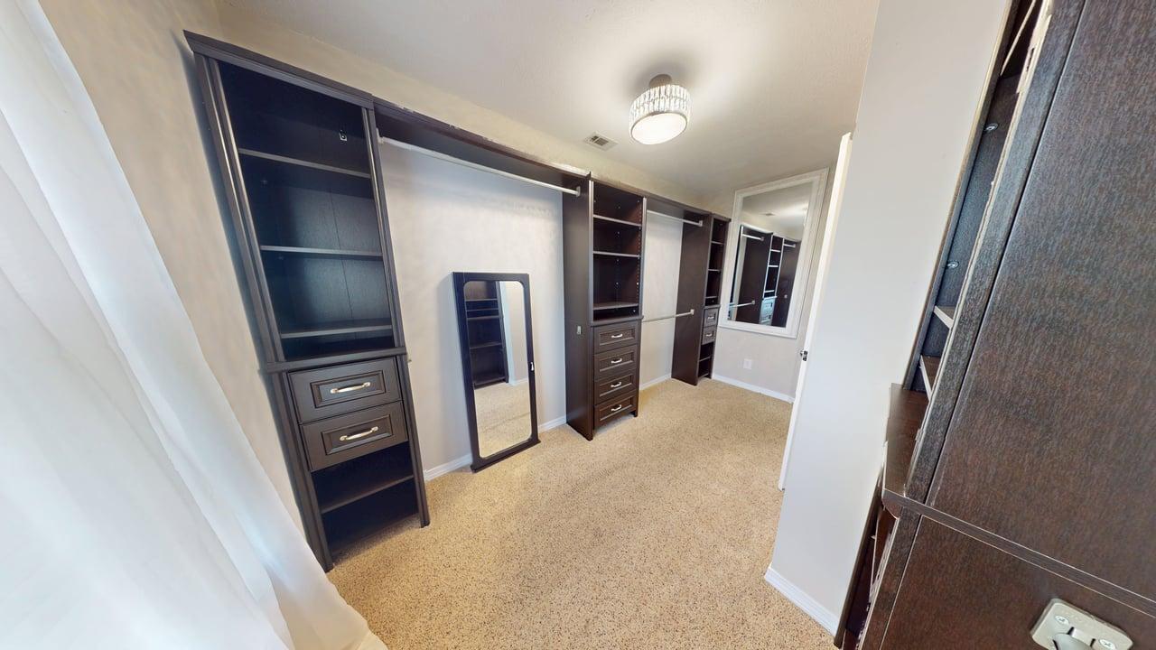 855 Mande Court Shalimar, FL 32579 - Photo 13 of 65 a view of walk in closet with furniture