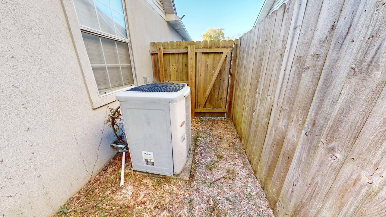 855 Mande Court Shalimar, FL 32579 - Photo 65 of 65 a view of a bathroom with a sink and a window