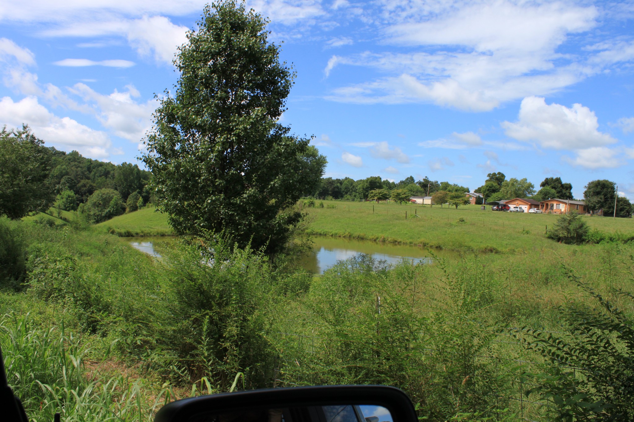 2 Old Mill Hill Road Dowelltown, TN 37059 - Photo 7 of 33 a view of a green yard with a fountain