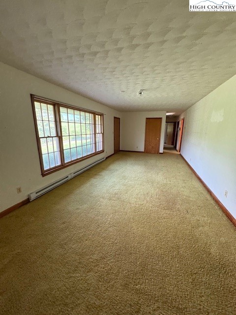 427 J E Gentry Road Crumpler, NC 28617 - Photo 16 of 30 an empty room with windows