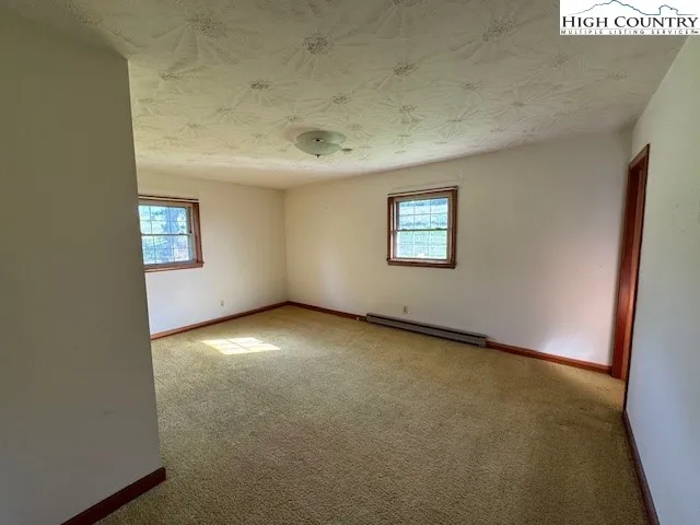 an empty room with windows