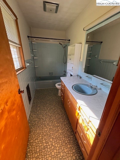 427 J E Gentry Road Crumpler, NC 28617 - Photo 19 of 30 a bathroom with a sink a vanity and mirror