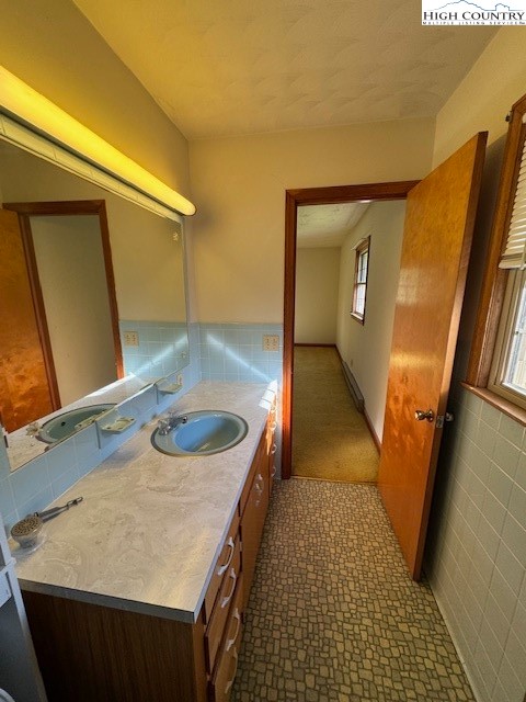 427 J E Gentry Road Crumpler, NC 28617 - Photo 20 of 30 a bathroom with a sink and a mirror