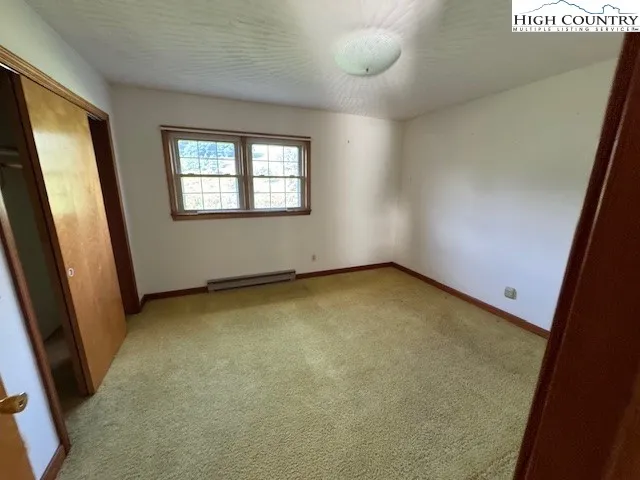 an empty room with a window