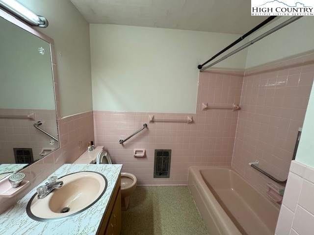 427 J E Gentry Road Crumpler, NC 28617 - Photo 25 of 30 a bathroom with a sink and a mirror