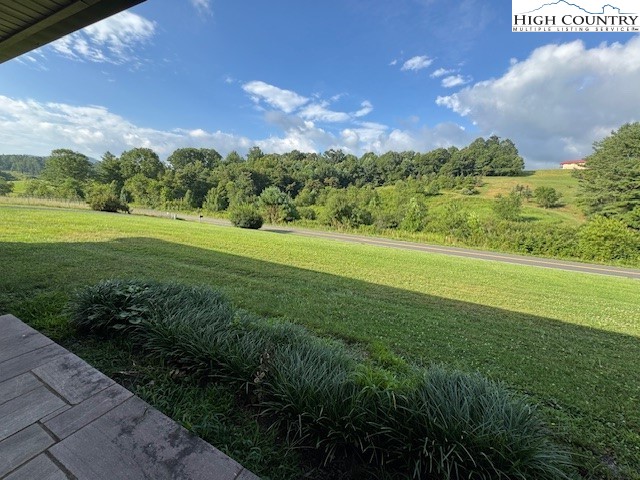 427 J E Gentry Road Crumpler, NC 28617 - Photo 7 of 30 a view of a green field with lots of green space